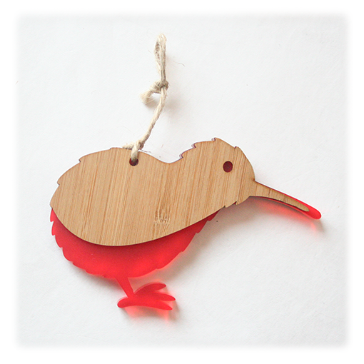 Vibrant red Kiwi Ornament made from bamboo and satin acrylic, perfect for holiday decor or gifting, measuring 139mm x 93mm.