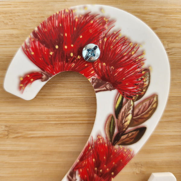 Stylish NZ Floral house number 6 in white acrylic, 12cm tall with vibrant colors, ideal for home address display.