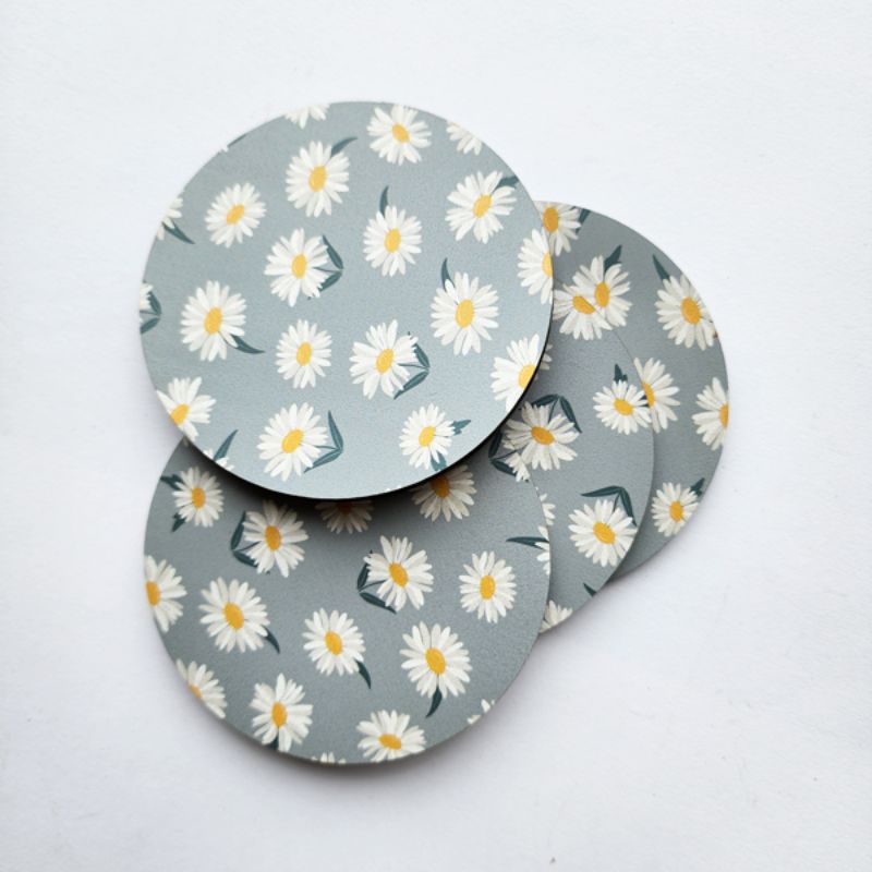 Single Mountain Daisy coaster, 10cm diameter, featuring a floral design on durable MDF with a cork base for stability.