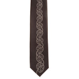 Elegant black Maori necktie featuring grey Kowhaiwhai design, perfect for formal and cultural occasions.