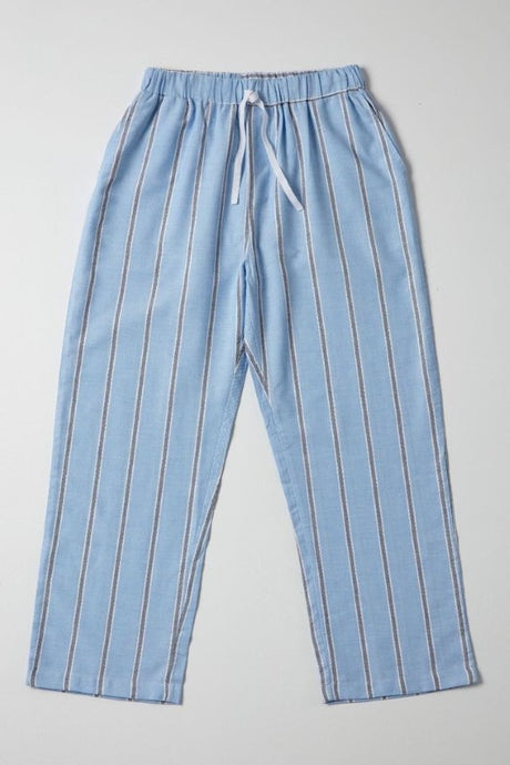 Light blue pajama pants with dark blue stripes and white borders, featuring an elastic waistband and pockets, by BAKSANA.