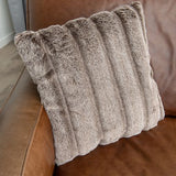 Luxurious 180GSM faux fur cushion in various hues, offering style and comfort while enhancing your decor.