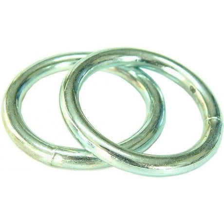 Welded zinc plated steel rings, 3mm x 25mm, durable and rust-resistant for various fastening and hanging applications.