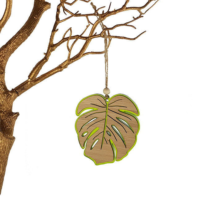 Lime green satin acrylic monstera ornament, 104mm, featuring intricate bamboo cutouts, perfect for indoor decor or gifting.