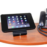 Lockable steel tablet stand for iPad, mounts on desk or wall, ideal for secure business and educational use.