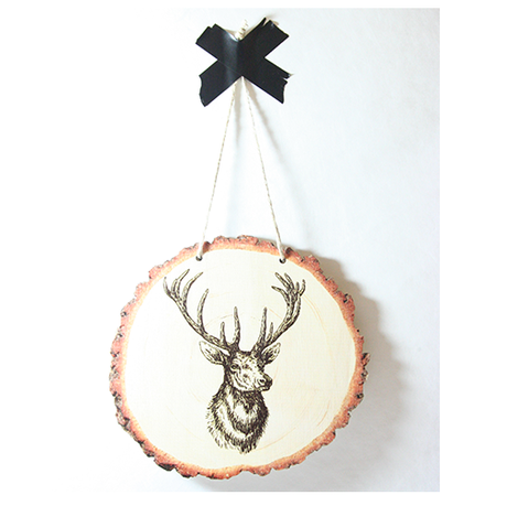 Rustic wood slice wall art featuring a majestic stag silhouette, crafted from eco-friendly pine veneer.
