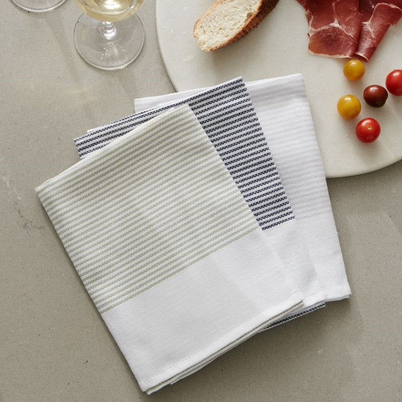 Set of three THIRSTY tea towels in Pebble, Ash, and Moss, crafted from absorbent OEKO-TEX® certified cotton.