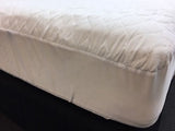 Quilted waterproof king mattress protector featuring durable, comfortable fabric and full mattress coverage for spill and stain protection.
