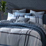 Yarmouth Blue Duvet Cover Set for queen beds, featuring soft cotton sateen, oversized tartan print, and fray edge trim.