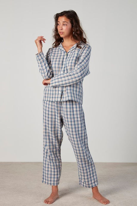 Classic plaid pajama set with long sleeve button-up top and drawstring pants, made from 100% OEKO-TEX® cotton.