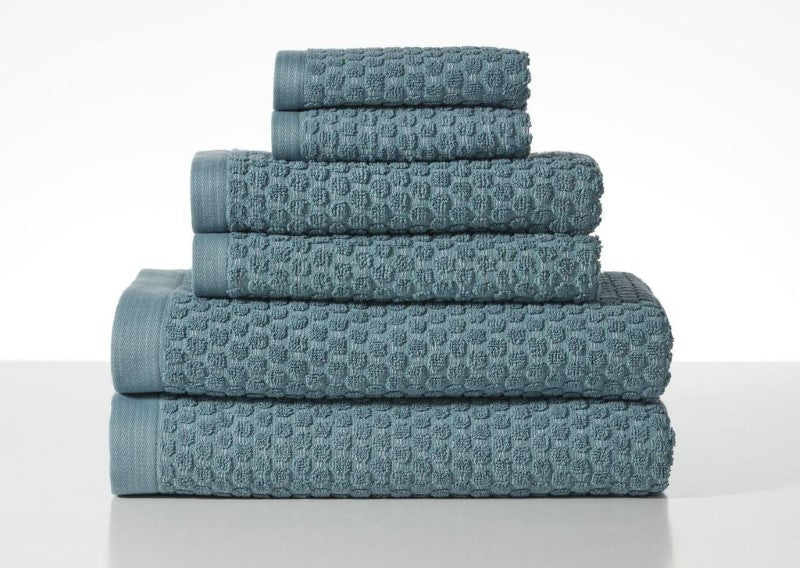 Henley Ocean Towel Bundle by BAKSANA, featuring 2 bath towels, 2 hand towels, and 2 facecloths, made from 100% cotton.