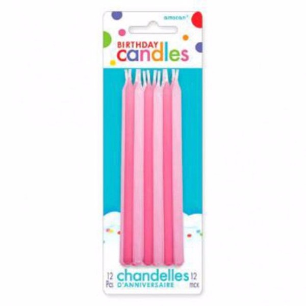 Pack of 12 pink slimline tapered candles, 13cm, perfect for elegant decor and romantic settings.