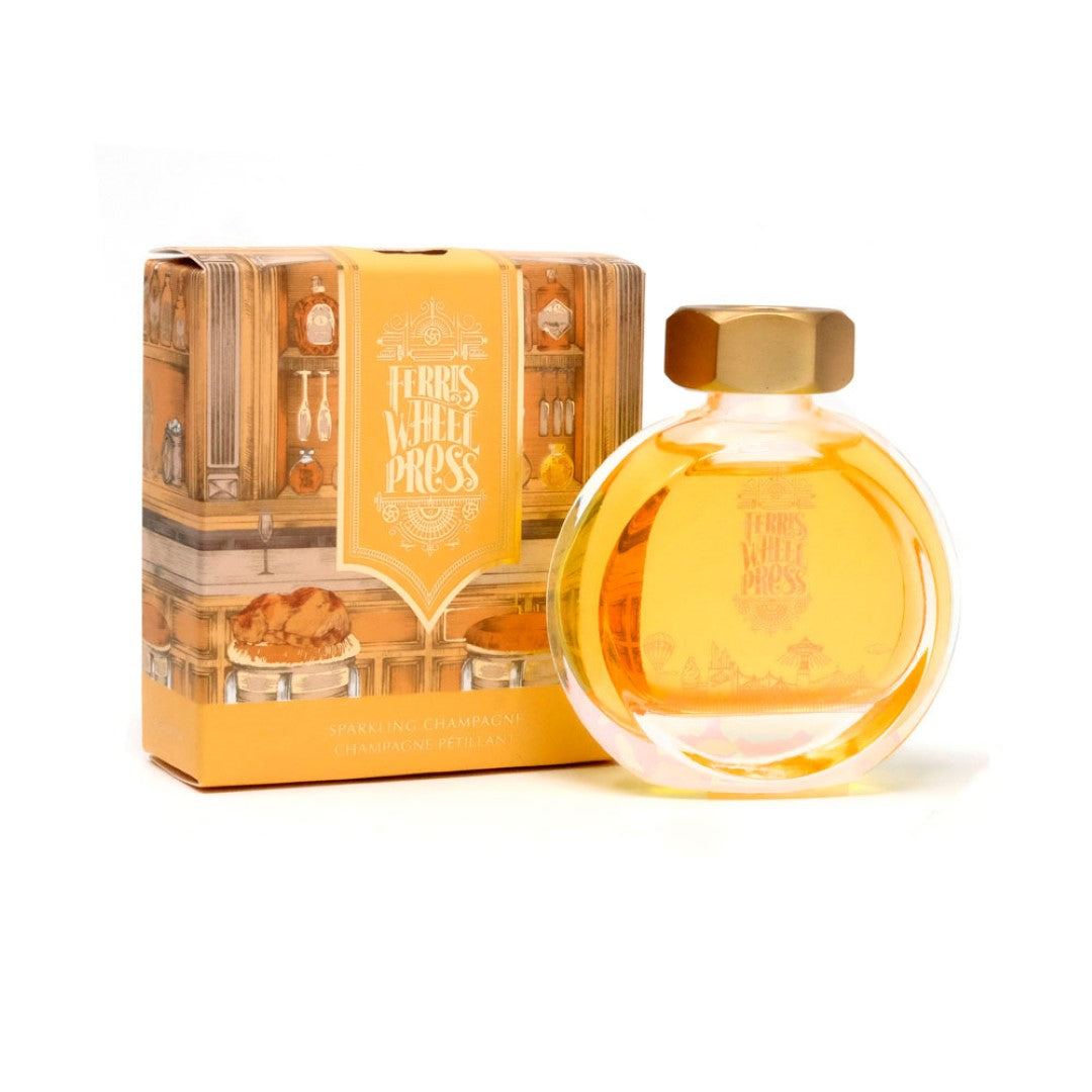 Ferris Wheel Press Sparkling Champagne ink in a decorative 38ml bottle, featuring a vibrant shimmering hue for elegant writing.