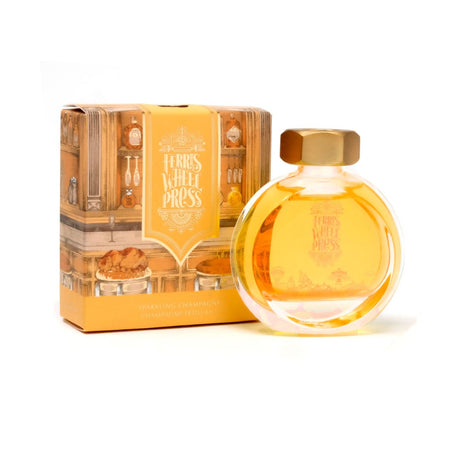 Ferris Wheel Press Sparkling Champagne ink in a decorative 38ml bottle, featuring a vibrant shimmering hue for elegant writing.