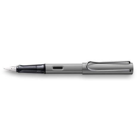 Lamy Al-Star Fountain Pen in graphite with fine nib, combining sleek design and smooth writing precision.