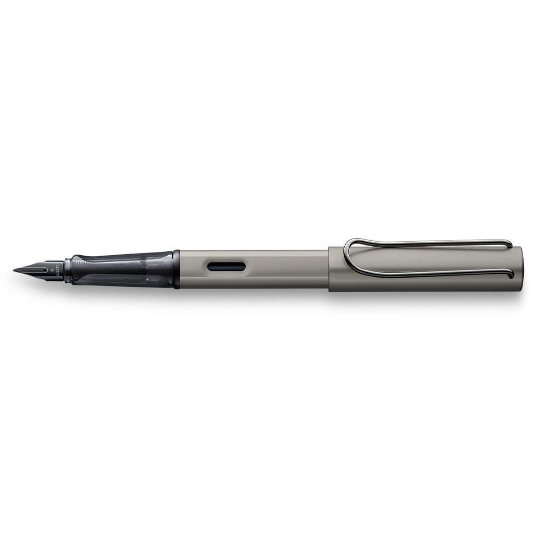 Lamy Lx Fountain Pen with Ruthenium finish and fine nib, blending luxury with ergonomic comfort for elegant writing.