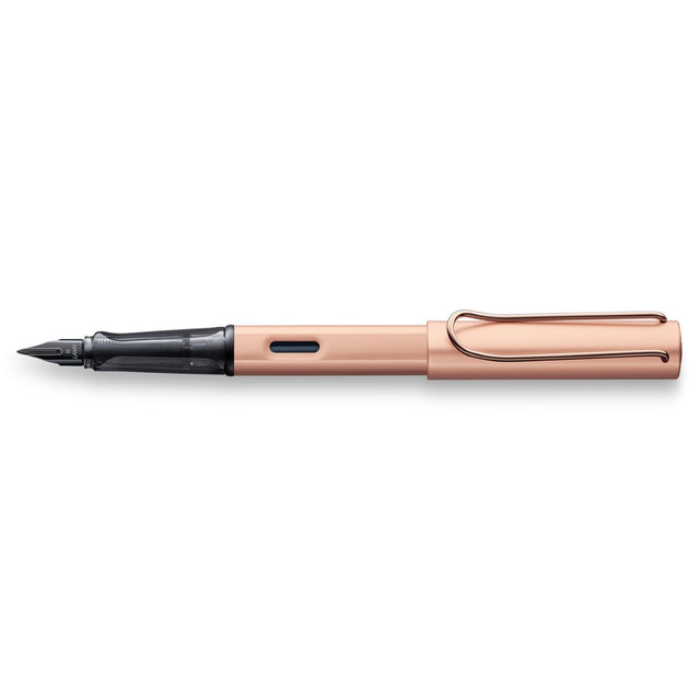 Lamy Lx Rose Gold Fountain Pen with fine nib, ergonomic design, and chic case, perfect for stylish writing and gifting.