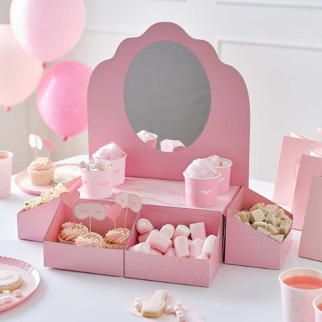 Pamper Party Pamper Station kit with pink polka dot boxes, treat tubs, mirror, and whimsical treat toppers for spa-themed fun.