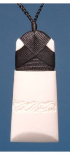 Engraved Toki Pendant (Medium) made of bone, featuring Maori designs symbolizing strength, on adjustable black wax cord.