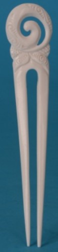 Handcrafted bone comb featuring a Koru design, symbolizing new beginnings, perfect for all hair types.