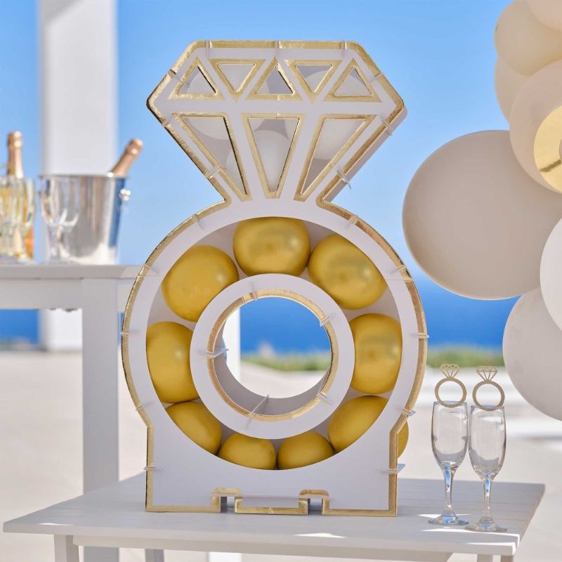 Engagement ring balloon mosaic stand featuring 10 white and 20 gold balloons, perfect for proposal or engagement celebrations.