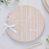 Sage green round wooden wedding guest book with cream ribbon, featuring 32 blank pages for guests' heartfelt messages.
