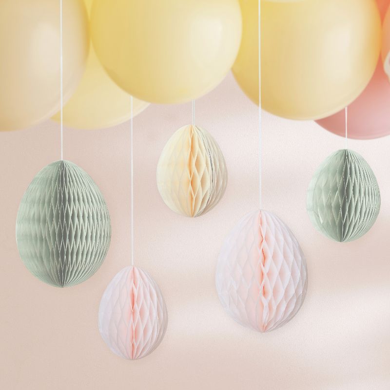 Colorful honeycomb Easter eggs in cream, light pink, and sage green for festive spring decorations, pack of 5.