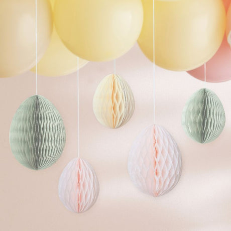 Colorful honeycomb Easter eggs in cream, light pink, and sage green for festive spring decorations, pack of 5.
