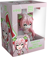 Youtooz Sakura Miku collectible figurine, 3.6 inches, with pink outfit and tea, adorned with sakura blossoms and cherries.