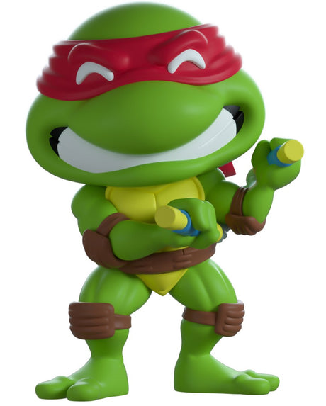 Youtooz Michelangelo collectible figure in red mask, holding nunchucks, captures TMNT nostalgia in vibrant detail.