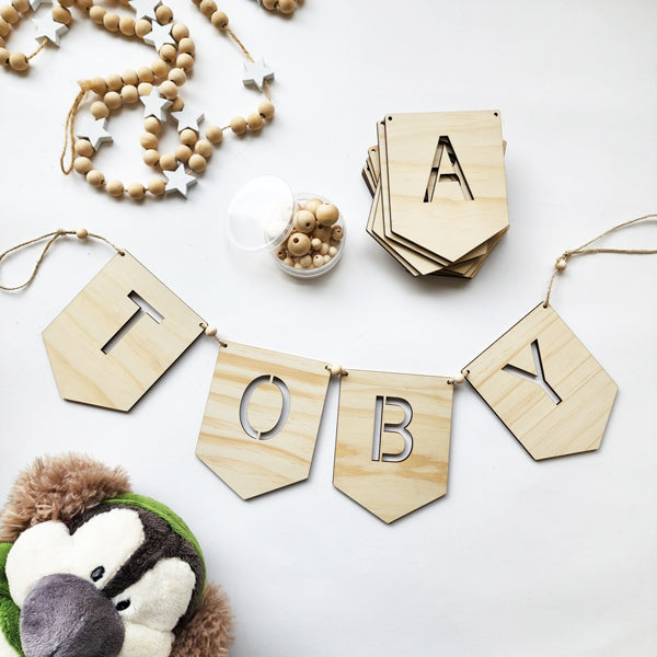 Eco-friendly Pine Bunting with alphabet flags, 12.8cm, perfect for personalized decor and celebrations.