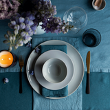 Elegant Baksana Peacock linen tablecloth (160x300cm) adds sophistication to dining with vibrant color and natural texture.