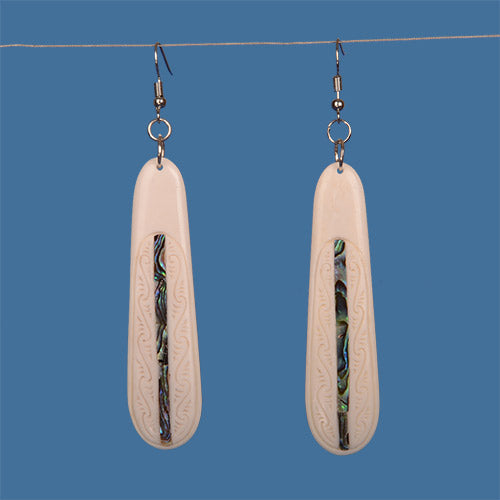 Elegant bone earrings featuring colorful Paua inlay, handcrafted, unique Maori jewelry for any occasion.