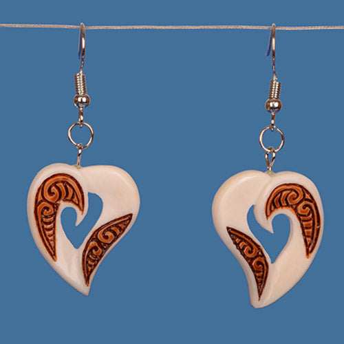 Handcrafted Bone Stained Heart Earrings, showcasing Maori artistry with unique carved designs and a modern elegant style.