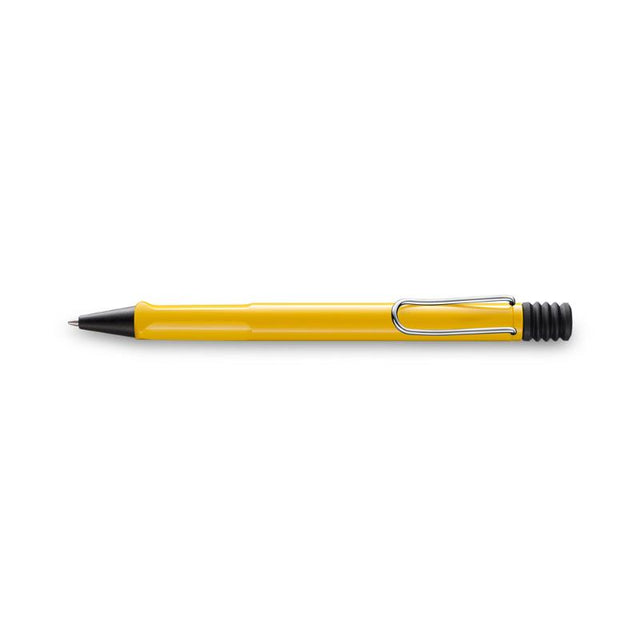 Vibrant yellow Lamy Safari ballpen with ergonomic grip and metal clip, designed for comfort and style in writing.