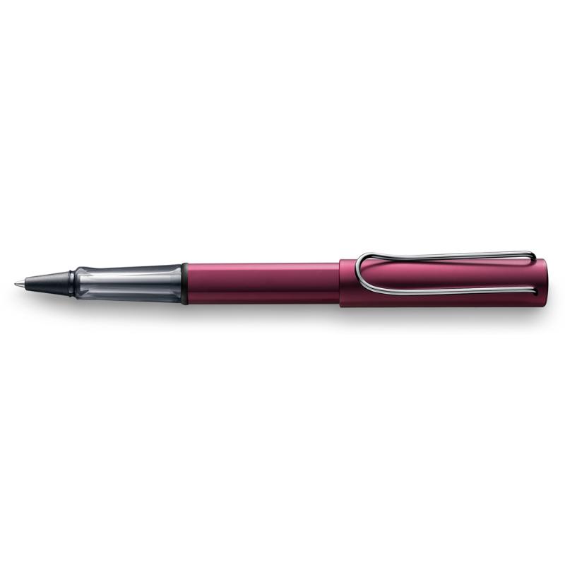 Lamy Al-Star Rollerball in Dark Purple (329) with anodised aluminium body, transparent grip, and metal clip for effortless writing.