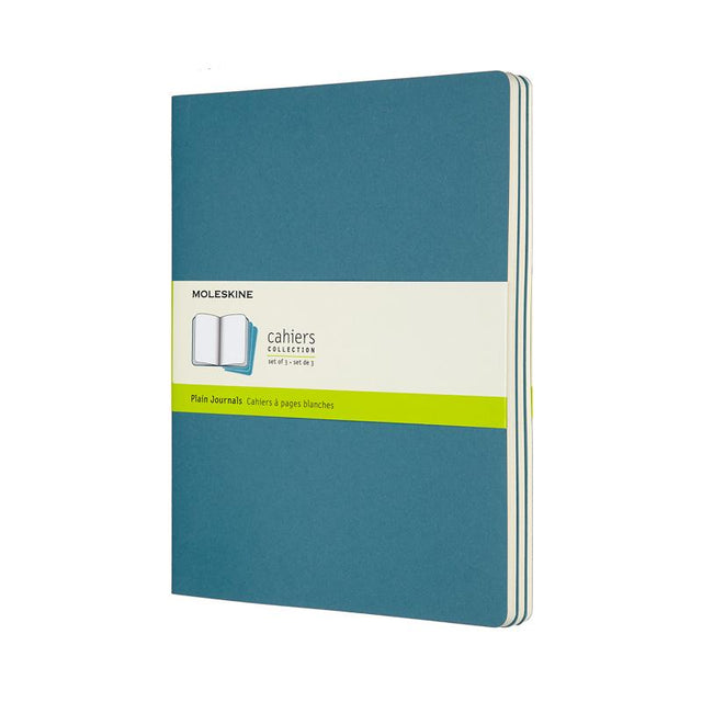 Moleskine Cahier Journal XL in Brisk Blue, pack of 3, featuring plain ivory pages for creative writing and sketching.