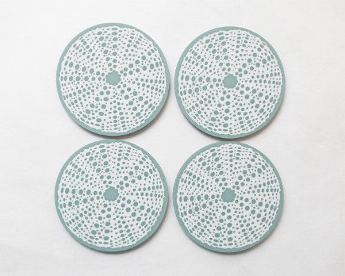 Set of 4 vibrant coasters featuring stunning botanical art, perfect for protecting surfaces and enhancing home decor.