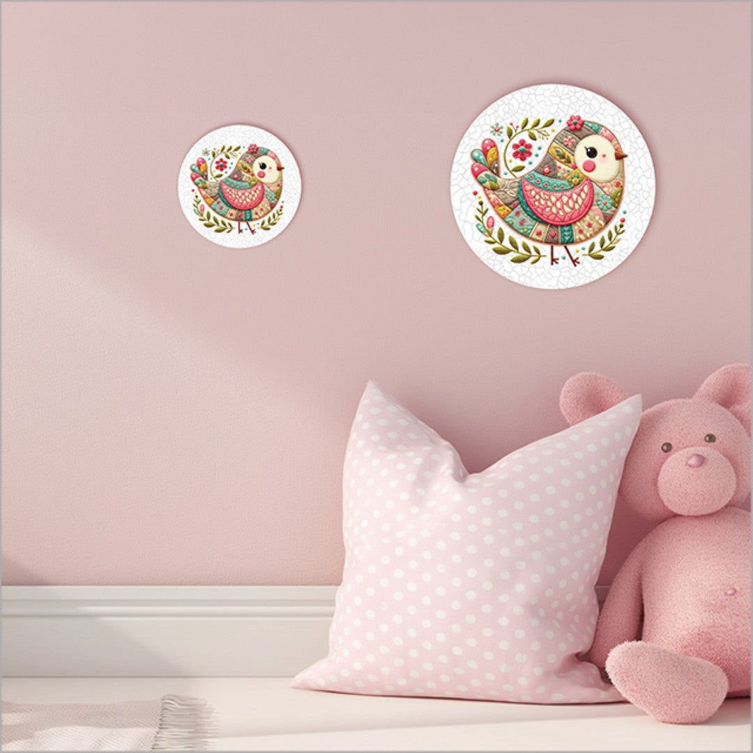 Canvas circle featuring a patchwork bird design in soft pink tones, ideal for vibrant home decor and easy hanging.