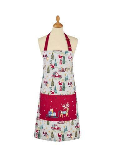 Sage-green Tis the Season cotton apron featuring festive Christmas designs, adjustable neck strap, and waist ties, measuring 70 x 95cm.