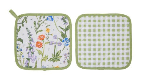 Cotton pot mat with intricate floral design and spring-green gingham reverse for heat protection and rustic charm.