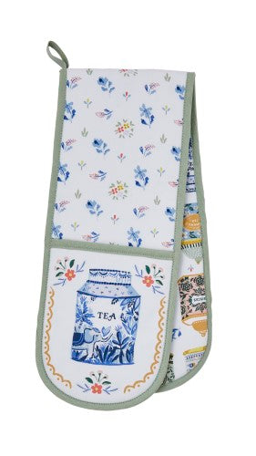 Ulster Weavers double oven glove showcasing eclectic hand-painted tea tin designs, 100% cotton, with protective wadding and hang loop.