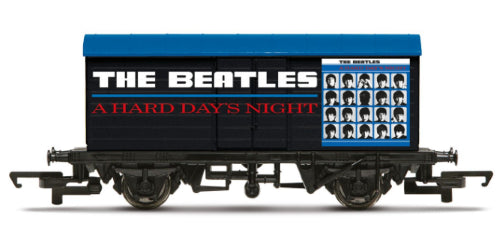 Hornby Beatles wagon featuring vibrant design, perfect for OO gauge layouts and a nostalgic tribute to 'A Hard Days Night'.