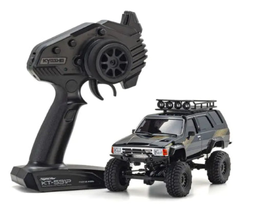 Radio Control Kyosho MX-01 4Runner Black: a rugged 1/10 scale RC truck with brushless motor for thrilling outdoor adventures.