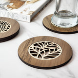 Handcrafted 10cm River Rimu coaster, showcasing unique reclaimed wood and elegant Pine veneer inlay, perfect for decor.