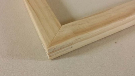 Heavy-duty 11-inch stretcher bar crafted from sustainable timber for canvas framing, featuring precision mitred corners.