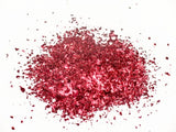 Vibrant red confetti glitter in a 500ml jar for crafting, scrapbooking, and festive decorations. Non-toxic and versatile.