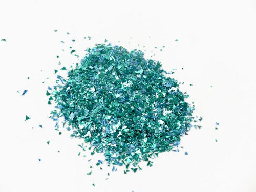 Turquoise confetti glitter 1kg bag, perfect for arts, crafts, parties, and safe for all ages.