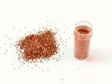 Vibrant apricot edible glitter for cakes, cookies, and desserts, enhancing creativity and presentations in baking and crafting.