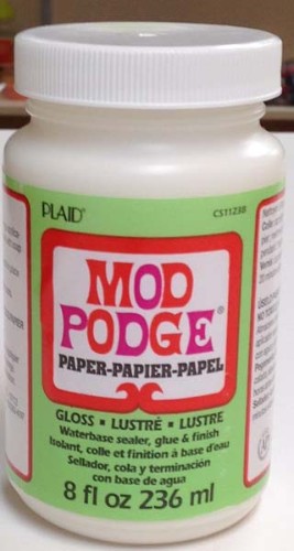 Crafting essential Paper Mod Podge Gloss 8oz for glossy finishes on scrapbooks and DIY projects.